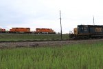 A pair of EJ&E SD38-2's work their old home rails as a CSX job passes in front